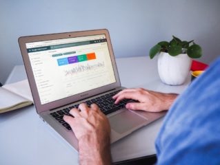 Person with Google Search Console displayed on screen